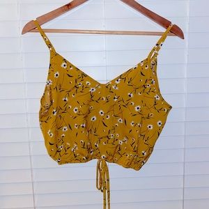 Cropped tank top with adjustable string tie around waist